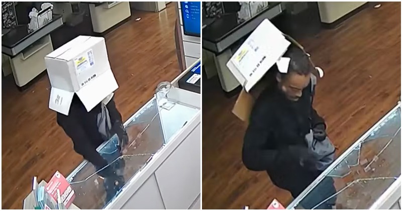 Dumb Thief removes his cardboard box mask to take a look at the stolen items for a moment;  he is arrested