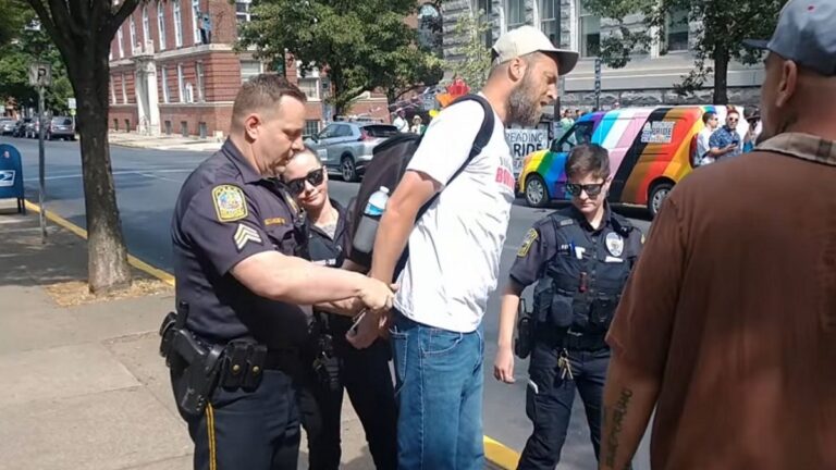 What did Damon Atkins do?  Man Arrested While Viral Video Shows Bible Quote At Gay Pride Event