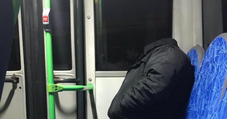 Optical illusion showing a 'headless' man in a jacket has people scratching their heads