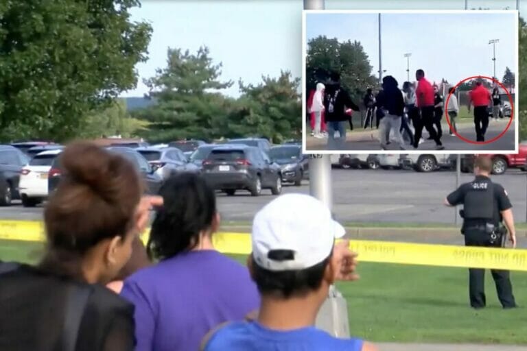 A security guard was shot in the back of the head while trying to break up a fight at a high school football game.