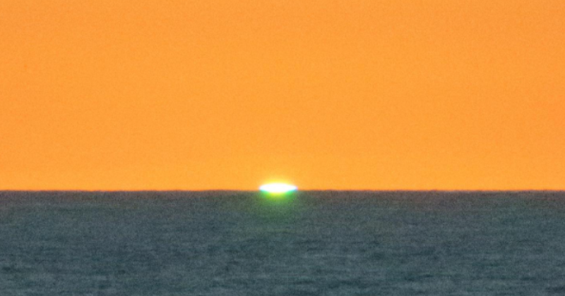 Have you ever seen a 'green sunrise'?  This Remarkable Real-Life Optical Illusion on Maui Might Change Your Mind