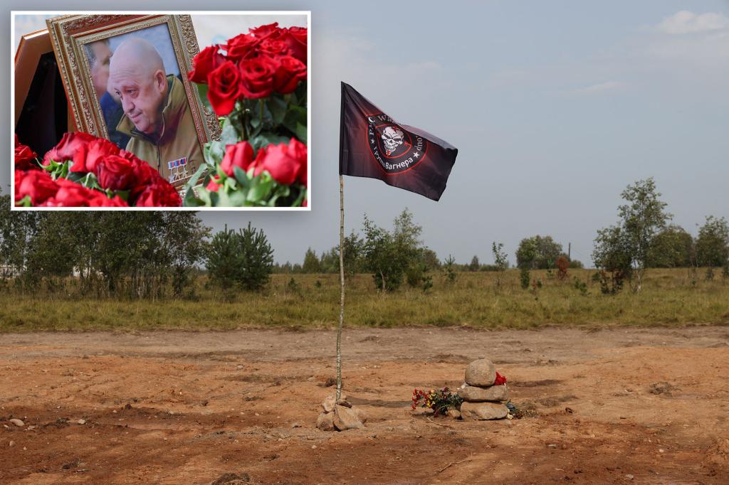 Wagner's "skull" flag flies at the crash site of Prigozhin's plane