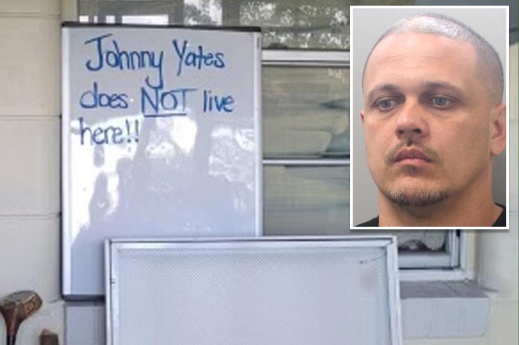 A man wanted in Florida tried to mislead police with a "I don't live here" sign
