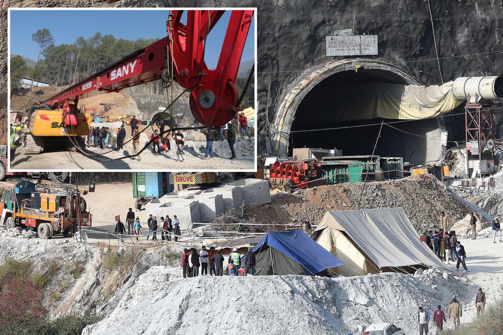 The operation to save 41 workers trapped in a tunnel in India is stopped after a machine breaks down