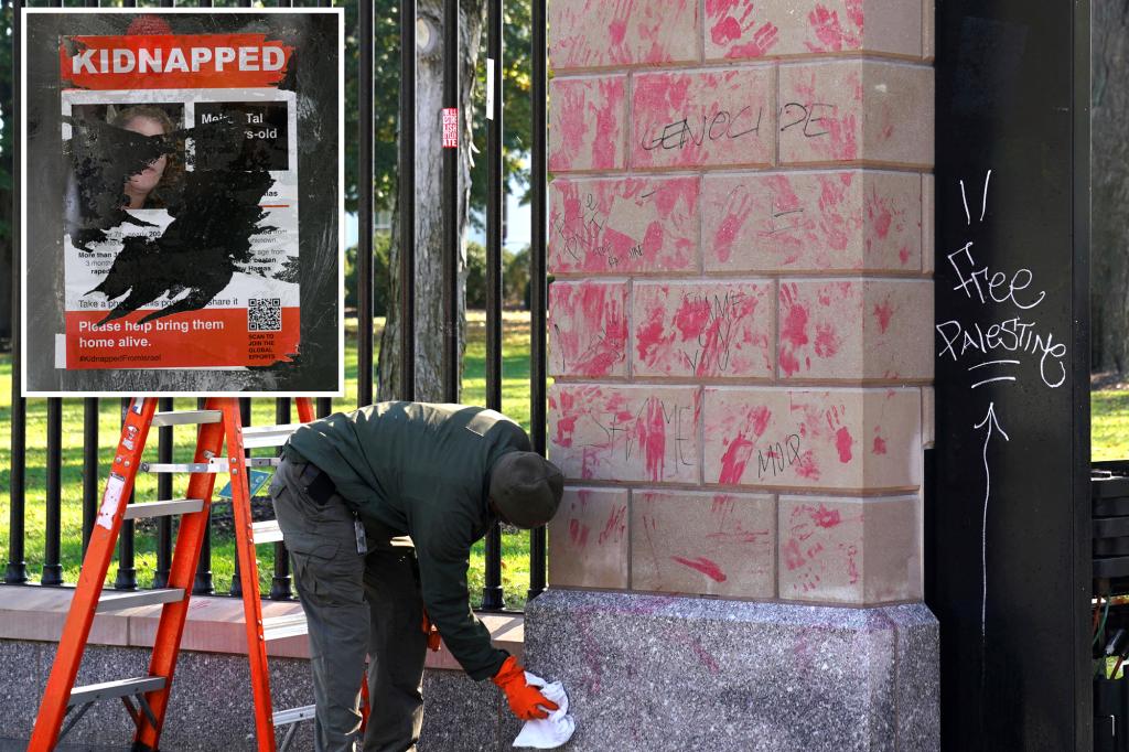 White House condemns protesters with red paint left on doors, but goes online to label torn down signs 'incorrect'