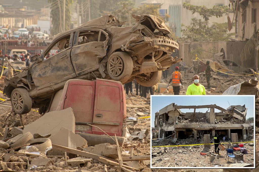 Explosion in Nigeria leaves 3 dead and 77 injured as rescuers frantically dig through the rubble in search of survivors