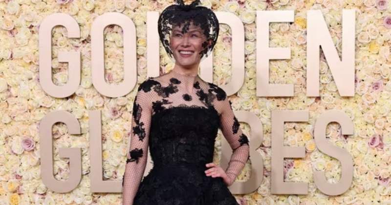 Golden Globes 2024: Rosamund Pike transforms a ski injury into a style statement, wearing a black lace dress and veil
