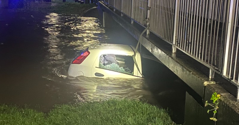 UK man rescues woman and child trapped in submerged car